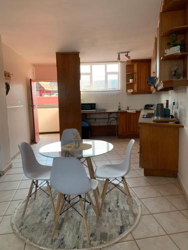 Kuchyň nebo kuchyňský kout v ubytování Peacehaven flat 208