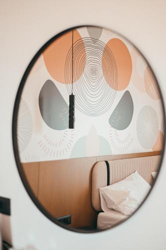 Postel nebo postele na pokoji v ubytování Monun Hotel