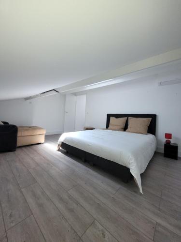 Cama o camas de una habitación en Appartement Les Saintes