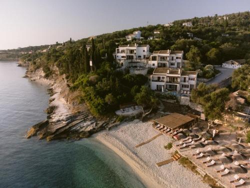 an aerial view of a resort on a beach at Anassa Mare Villas & Residences by GHH in Gaios