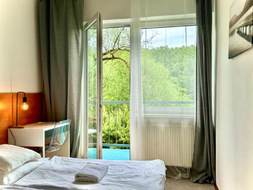 Postel nebo postele na pokoji v ubytování Hotel Admiral