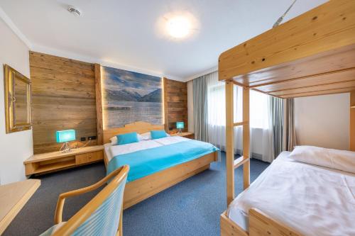 Postel nebo postele na pokoji v ubytování Berghotel Ronach