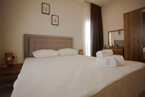 Postel nebo postele na pokoji v ubytování First Class by Antalya Suites