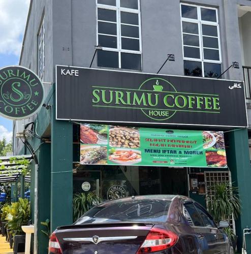 a car parked in front of a sunivan coffee shop at 7 STAY#1 - 1 Room for 3 Pax at Kuala Berang -Best Travelers Stay in Kuala Berang