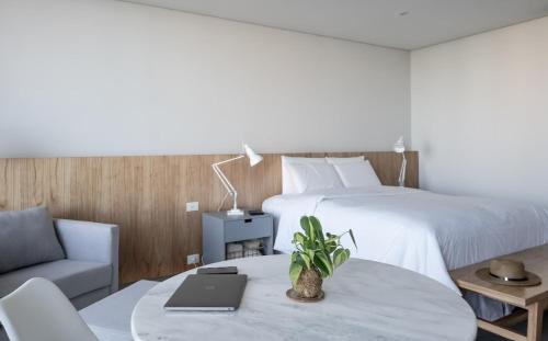 Cama o camas de una habitación en ZT Coliving and Hotel