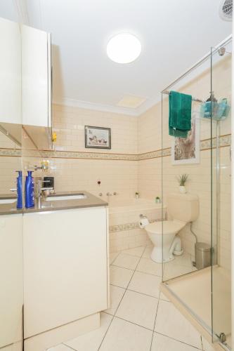 a bathroom with a toilet and a sink at Brunswick Melbourne-Cosy Room-Great location in Melbourne