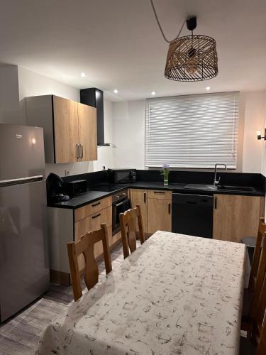 Dapur atau dapur kecil di Joli appartement Flocons