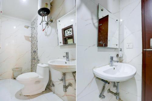 a bathroom with a toilet and a sink at HOTEL GLOBAL STAY NEAR DELHI AiRPORT in New Delhi