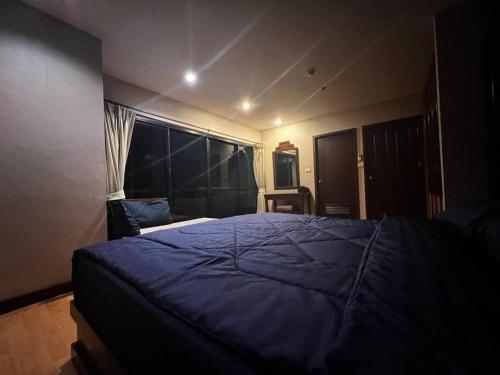 Ένα ή περισσότερα κρεβάτια σε δωμάτιο στο Patong Tower Apartment - AMP