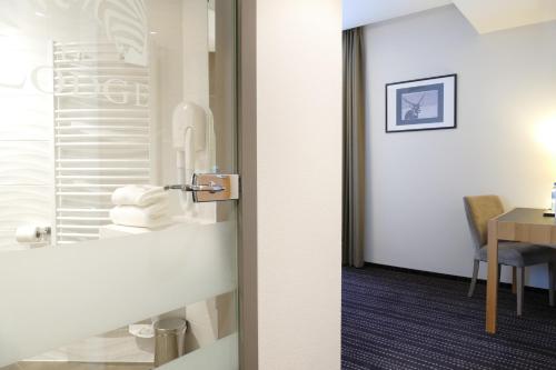 Koupelna v ubytování Le Lodge Brit Hotel Strasbourg Zenith