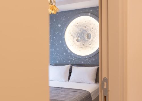 a room with a bed with a painting on the wall at Los Suites in Antalya