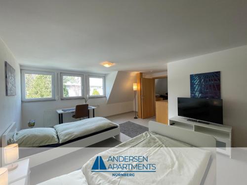 a bedroom with a bed and a tv in a room at Toplage für Beruf & Freizeit in Nürnberg - Andersen Apartments in Nürnberg
