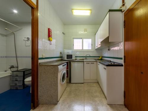 Kuchyň nebo kuchyňský kout v ubytování Apartamentos Sunway Tara