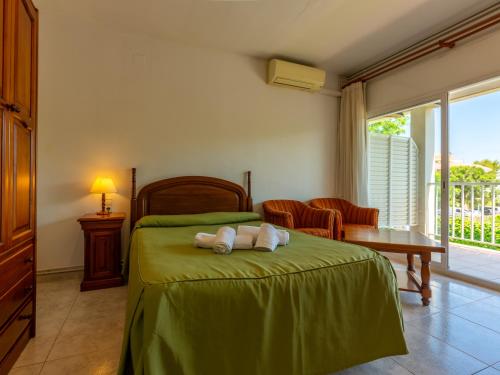 Postel nebo postele na pokoji v ubytování Apartamentos Sunway Tara