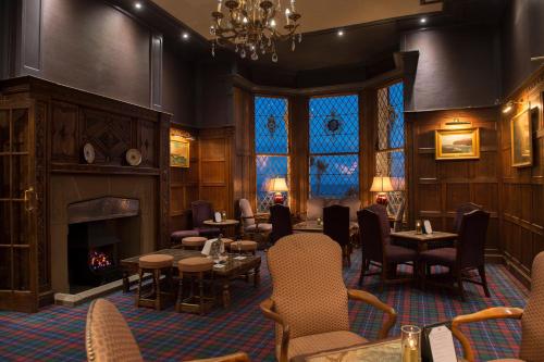 A restaurant or other place to eat at Regency Hotel 