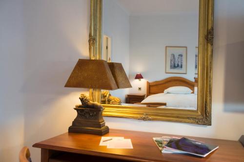 Cama o camas de una habitación en Regency Hotel