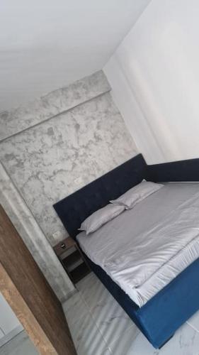 a small bed in a small room with at Raul Studio in Saturn
