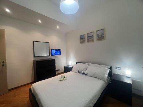 Ένα ή περισσότερα κρεβάτια σε δωμάτιο στο Casa Mirella by Holiday World