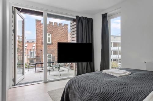 Foto Cosy 4-Person Apartment in The Heart of Aarhus 3