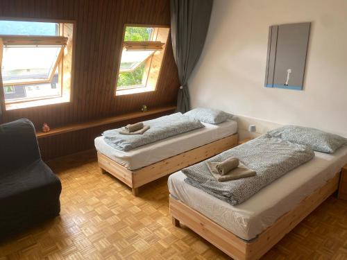 Postel nebo postele na pokoji v ubytování App Bovec