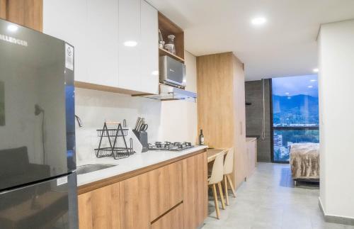 Dapur atau dapur kecil di Loft moderno en Armenia con ubicación privilegiada 6