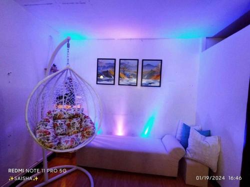 Ένα ή περισσότερα κρεβάτια σε δωμάτιο στο La Casă Dulce JVC Staycation for FamilyBarkada