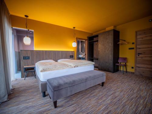 Llit o llits en una habitació de Hotel Buchholz