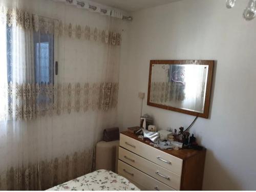 Postel nebo postele na pokoji v ubytování Appartement vu sur mer Menzel Temime
