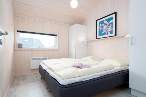 Postel nebo postele na pokoji v ubytování Resort 2 Beach House B 55