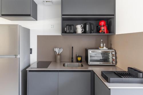 Dapur atau dapur kecil di Baliñas Boutique