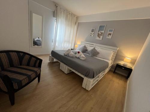 Ένα ή περισσότερα κρεβάτια σε δωμάτιο στο Flat in Armacao de Pera