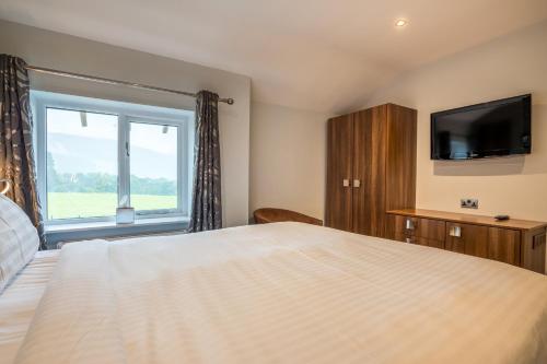 Postel nebo postele na pokoji v ubytování Ullswater View House