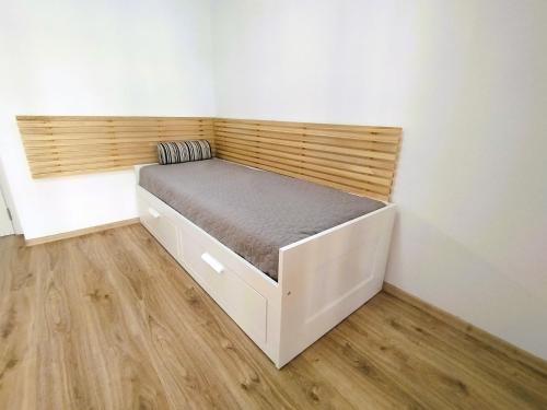 a small bedroom with a bed in a room at Beatris in Pomorie