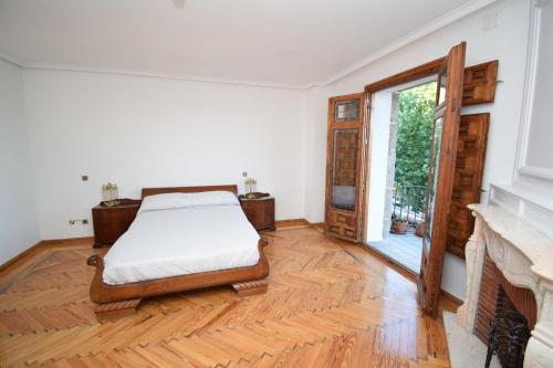 Ένα ή περισσότερα κρεβάτια σε δωμάτιο στο La Casona Imperial 2