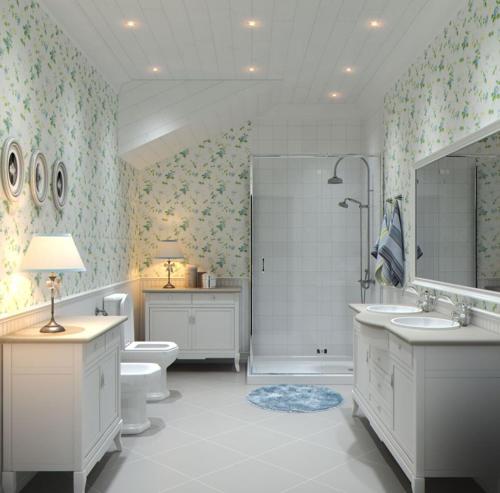 a bathroom with two sinks and a toilet and a shower at Luxury resort in Palūkštis