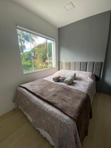 Ένα ή περισσότερα κρεβάτια σε δωμάτιο στο Casa Cremerie Suites