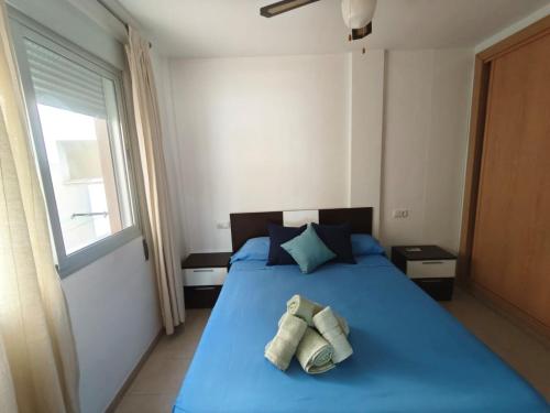 En eller flere senge i et værelse på Vistas al mar y con garaje