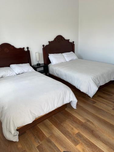 Postel nebo postele na pokoji v ubytování Motel M