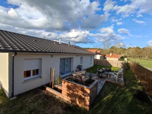 Maison sur le bassin