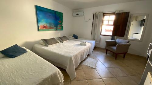Cama o camas de una habitación en Pousada dos Contos