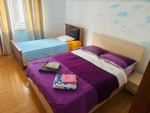 Giường trong phòng chung tại Casa Aris