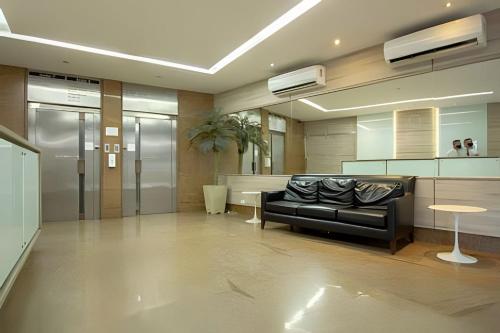 Χώρος καθιστικού στο Flat 1Q Praia de Copacabana - Apto 202