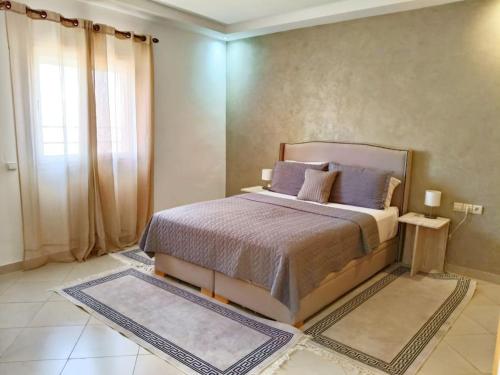 Postel nebo postele na pokoji v ubytování Family House Marrakech