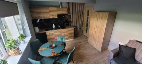 Η κουζίνα ή μικρή κουζίνα στο BŁĘKITNA 37 apartamenty