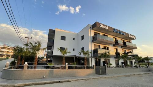 a building on the side of a street at RADINA FAMILY in Kallithea Halkidikis
