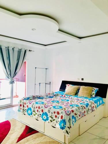 Ένα ή περισσότερα κρεβάτια σε δωμάτιο στο Residence Mofat