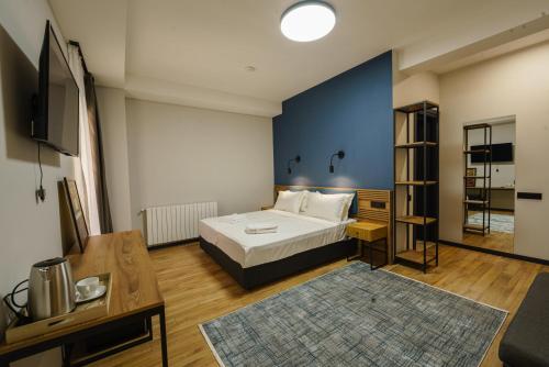 Postel nebo postele na pokoji v ubytování ARAKI Sololaki