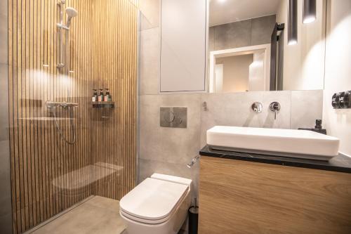 Ένα μπάνιο στο Navigare Apartments