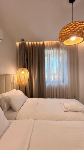 Ένα ή περισσότερα κρεβάτια σε δωμάτιο στο Norte Luxury Villas
