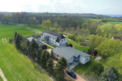 an aerial view of a large house in a field at MP 5 Meeresrauschen in Steinbeck